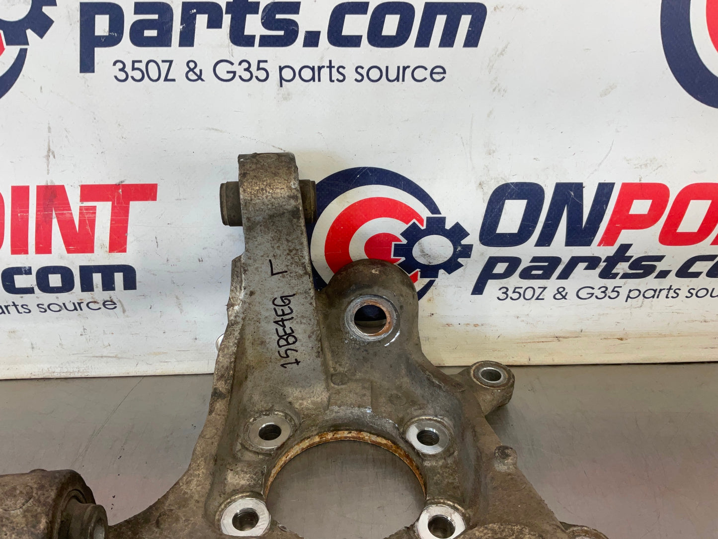 2004 Infiniti G35 Driver Left Rear Suspension Knuckle Axle Housing OEM 15BE4EG - On Point Parts Inc