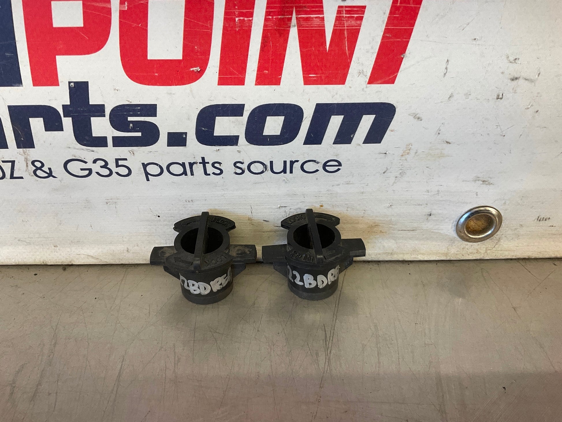 2003 Infiniti G35 Upper Radiator Support Locks with Bushings OEM 22BDREC - On Point Parts Inc
