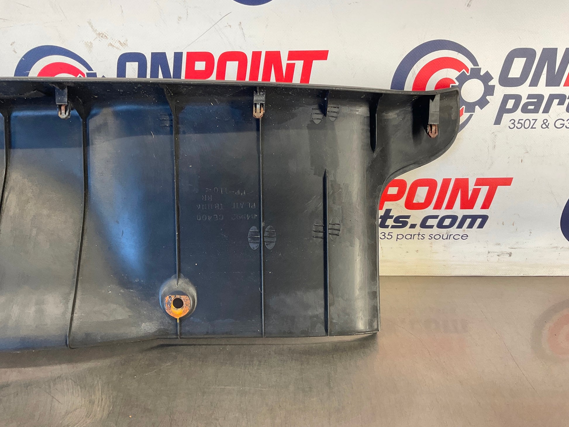 2006 Nissan 350Z Convertible Rear Trunk Latch Trim 84992 OEM 23BC9E8 - On Point Parts Inc